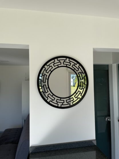 espejo con diseño circular en aluminio compuesto